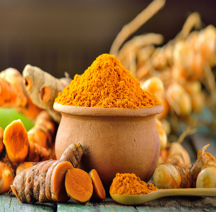 مخلوط زردچوبه با شیروعسل برای درمان پوکی استخوان